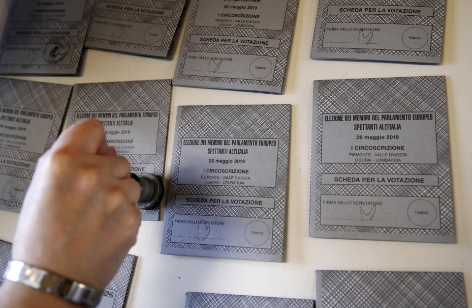 Ballots are being prepared ahead of Sunday's European Elections, in Rozzano, near Milan, Italy, Saturday, May 25, 2019. Some 400 million Europeans from 28 countries head to the polls from Thursday to Sunday to choose their representatives at the European Parliament for the next five years. (AP Photo/Antonio Calanni)