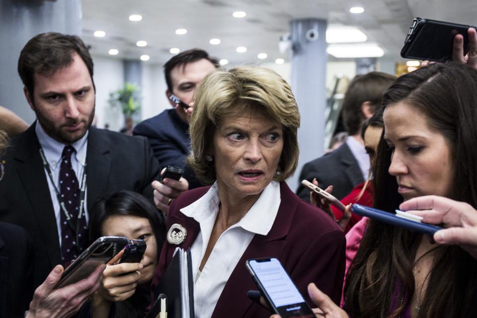 Sen. Lisa Murkowski, R-Alaska, leaves a closed-door Senate Republican caucus on Tuesday.