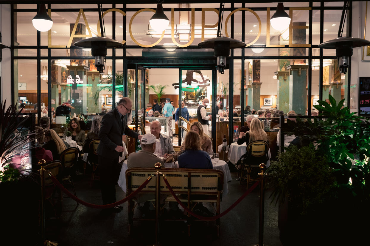 Diners at La Coupole, a brasserie in the Montparnasse quarter of Paris, on Oct. 5, 2023. (Dmitry Kostyukov/The New York Times)