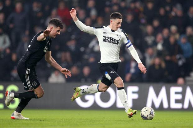 Derby County&#39;s Tom Lawrence scores their side&#39;s first goal of the game during the Sky Bet Championship match at Pride Park Stadium, Derby. Picture date: Saturday January 15, 2022. PA Photo. See PA story SOCCER Derby. Photo credit should read: