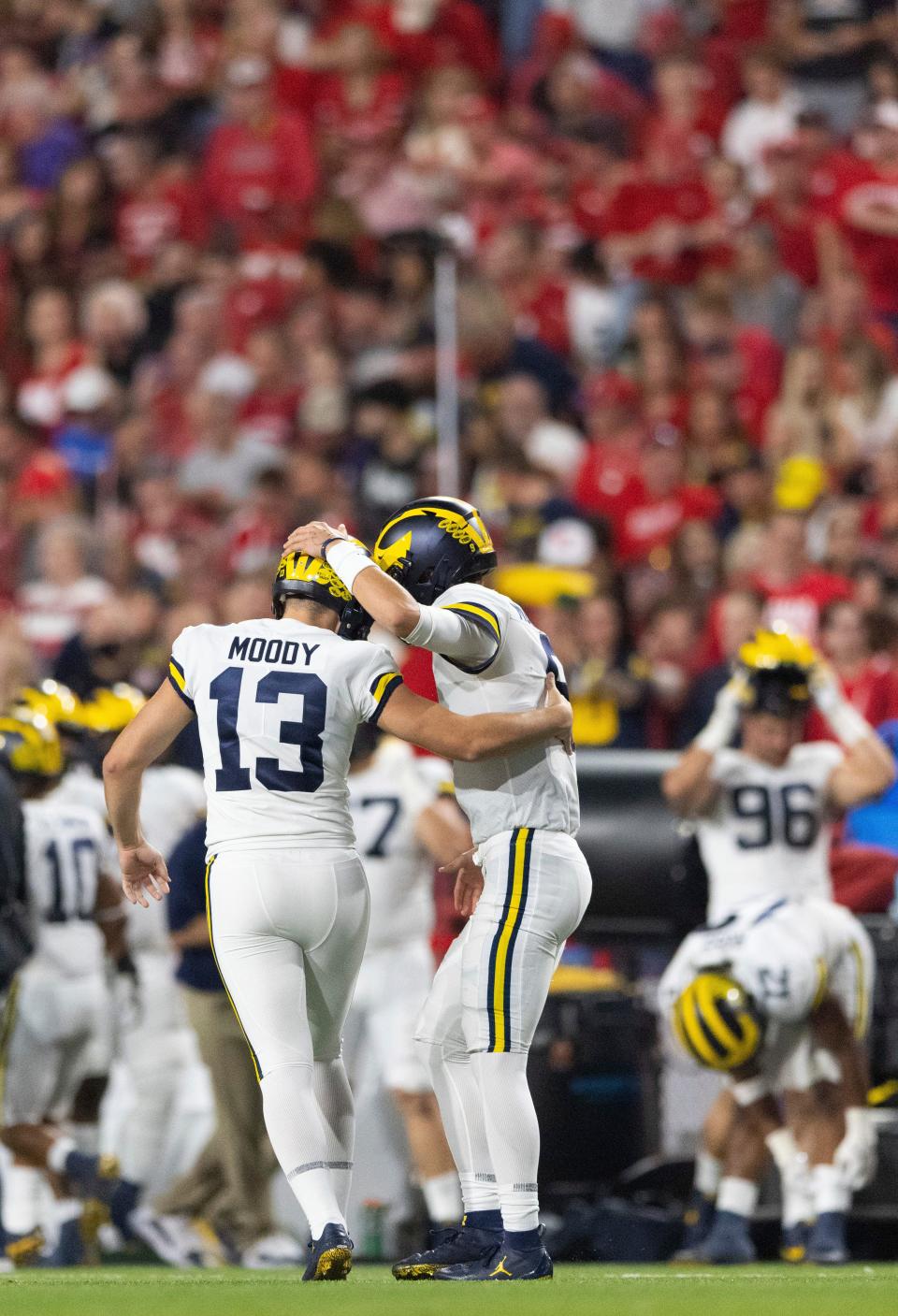 Michigan's Jake Moody (13) celebrates with holder J.J. McCarthy after kicking a field goal against Nebraska during the first half of an NCAA college football game Saturday, Oct. 9, 2021, at Memorial Stadium in Lincoln, Neb. (AP Photo/Rebecca S. Gratz)