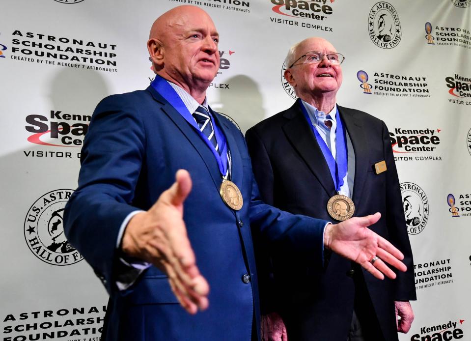 U.S. Senator Mark Kelly and Roy D. Bridges talk to the media after their induction into the U.S. Astronaut Hall of Fame Saturday, May 6, 2023 at Kennedy Space Center Visitor Complex. Craig Bailey/FLORIDA TODAY via USA TODAY NETWORK