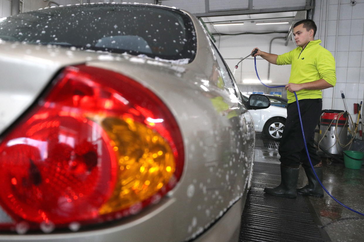 KAZAN, RUSSIA - AUGUST 13, 2019: Washing a car in the Fabrika car wash at Spartakovskaya Street in the city of Kazan, Tatarstan, Russia. Yegor Aleyev/TASS (Photo by Yegor Aleyev\TASS via Getty Images)