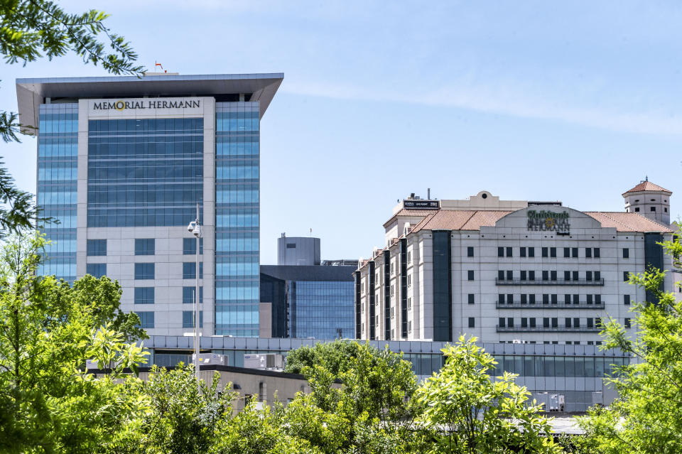 Buildings associated with Memorial Hermann Hospital and medical complex are visible Friday, April 12, 2024 in the Medical Center district of Houston. Memorial Hermann-Texas Medical Center has halted its liver transplant and kidney transplant programs. The Houston Chronicle reported Thursday that the hospital discovered a doctor manipulated records for liver transplant candidates. (Kirk Sides/Houston Chronicle via AP)