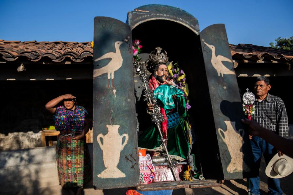 Members of the Achi community in Baja Verapaz, Guatemala, go house to house with their patron saint seeking donations in early March 2020.