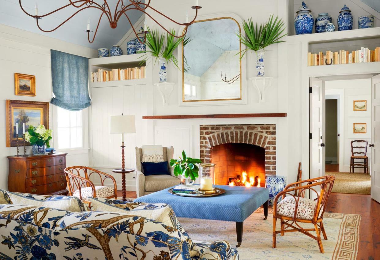 coastal living room with blue and white upholstery and rattan accents