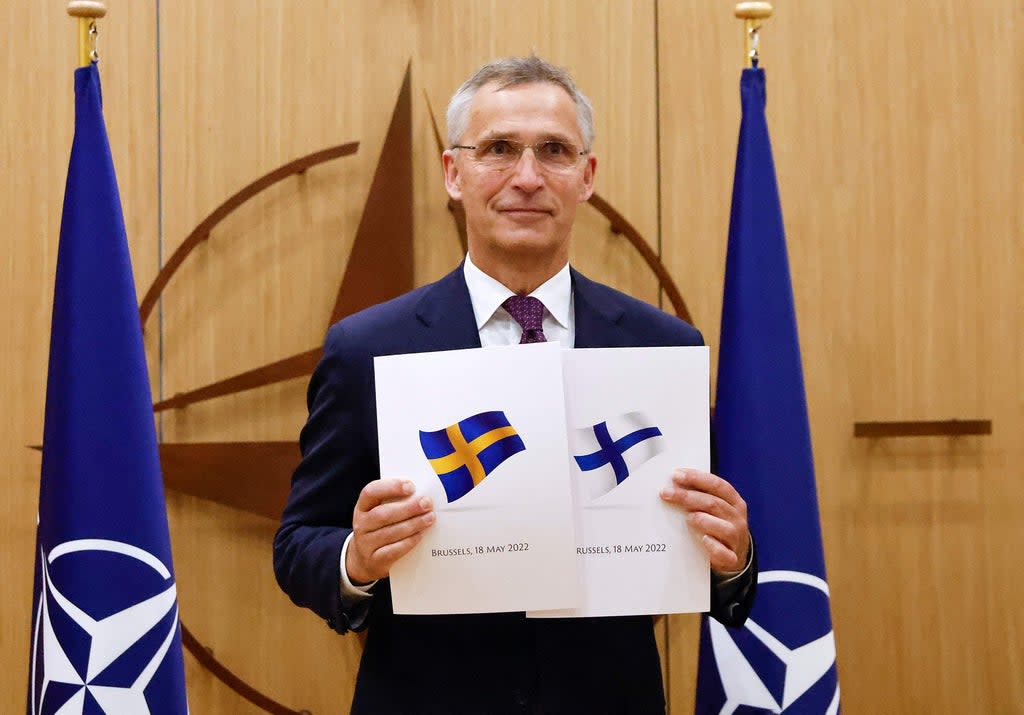 Nato Secretary-General Jens Stoltenberg poses during a ceremony to mark Sweden’s and Finland’s application for membership in Brussels (POOL/AFP via Getty Images)