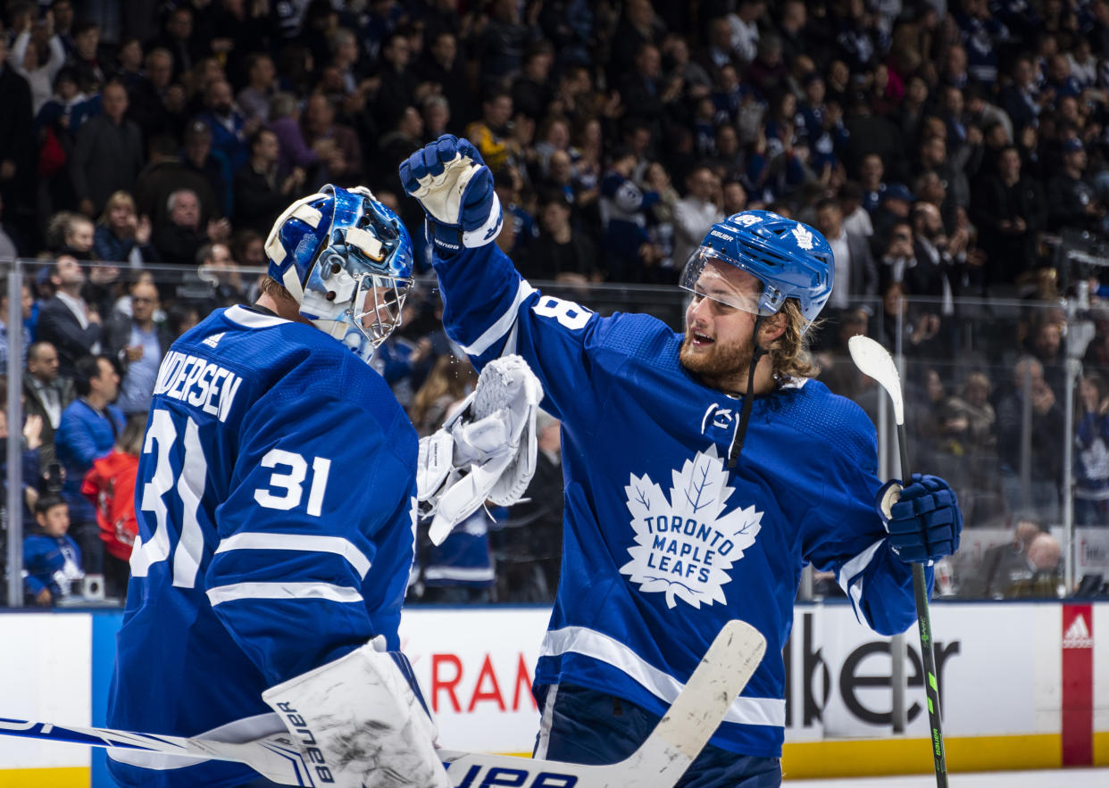 TORONTO, ON - FEBRUARY 20: Frederik Andersen #31 of the Toronto Maple Leafs celebrates with teammate William Nylander #88  after defeating the Pittsburgh Penguins at the Scotiabank Arena on February 20, 2020 in Toronto, Ontario, Canada. (Photo by Kevin Sousa/NHLI via Getty Images)