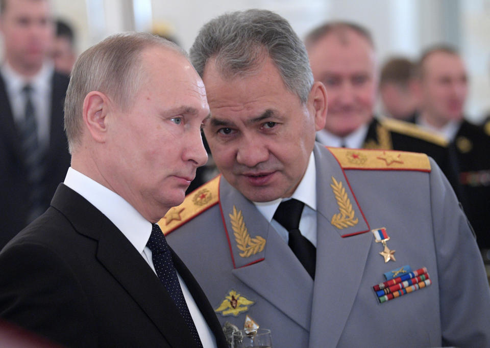 Putin and Defense Minister Sergei Shoigu. (Photo: Sputnik Photo Agency/Reuters)