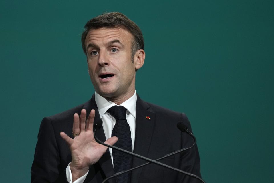 France President Emmanuel Macron speaks during a plenary session at the COP28 U.N. Climate Summit, Friday, Dec. 1, 2023, in Dubai, United Arab Emirates. (AP Photo/Peter Dejong)