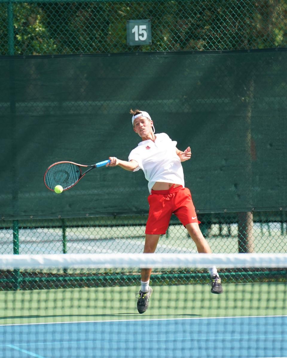 Vero Beach's Figge Pernfors hits a return during the 4A tennis state semifinals against Miami Palmetto at Sanlando Park on Thursday, April 27, 2023 in Altamonte Springs.