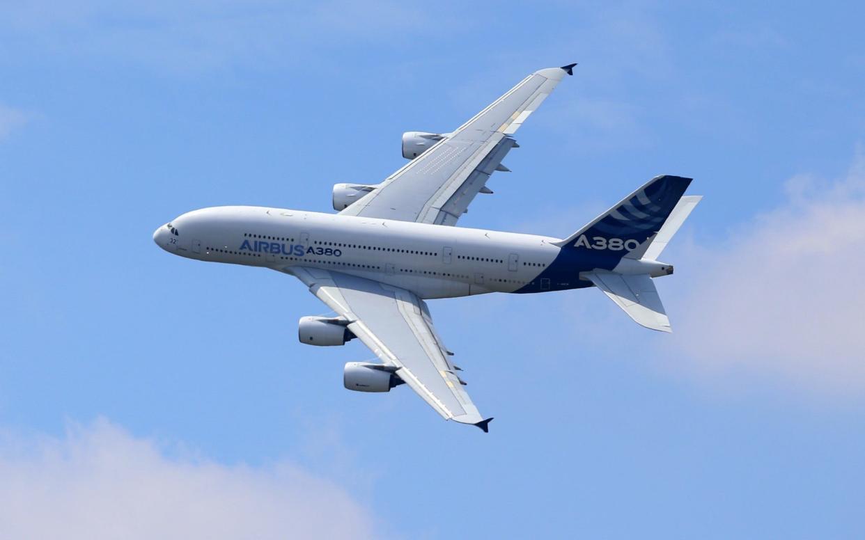 An Airbus SAS A380 super jumbo performs a flying display on day two of the 51st International Paris Air Show in Paris, France, on Tuesday, June 16, 2015 - Bloomberg