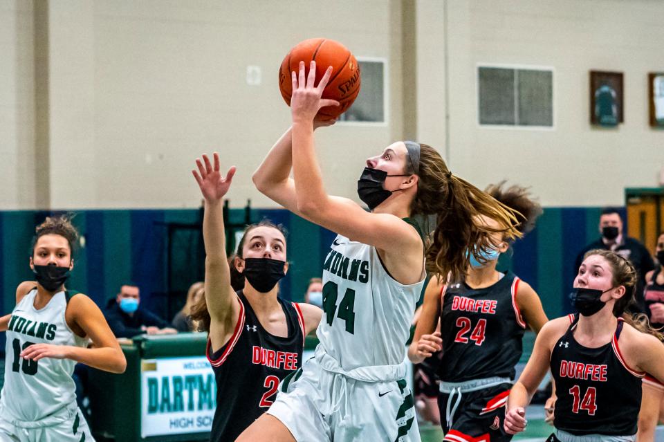 Dartmouth's Kat Cheesebro lays it in during a game last season. She scored 21 points in Dartmouth's season opener on Friday.