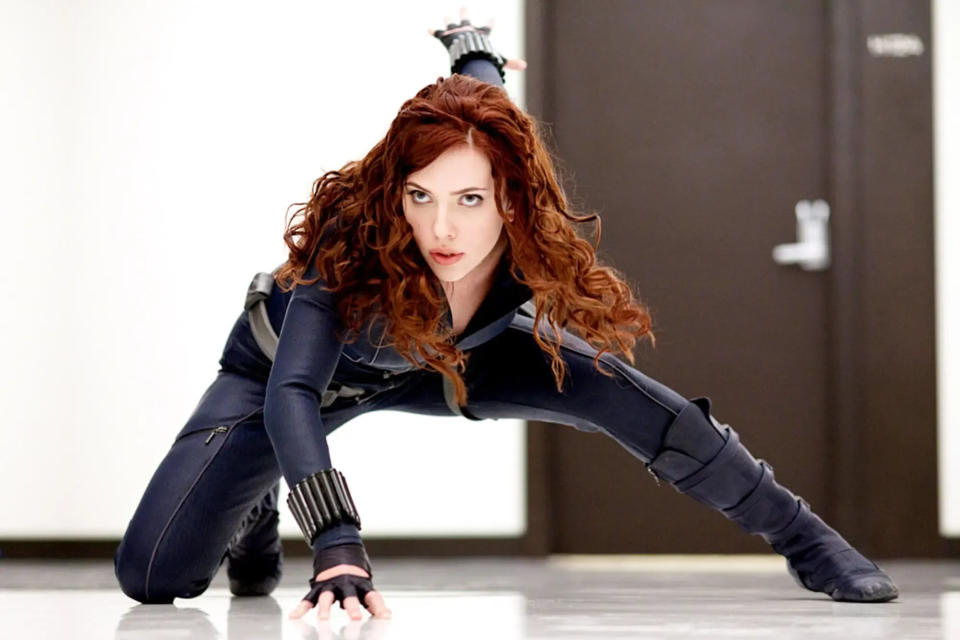 Scarlett Johansson, shown here in classic Black Widow pose, is the lead actor with the highest-grossing overall movie box office.