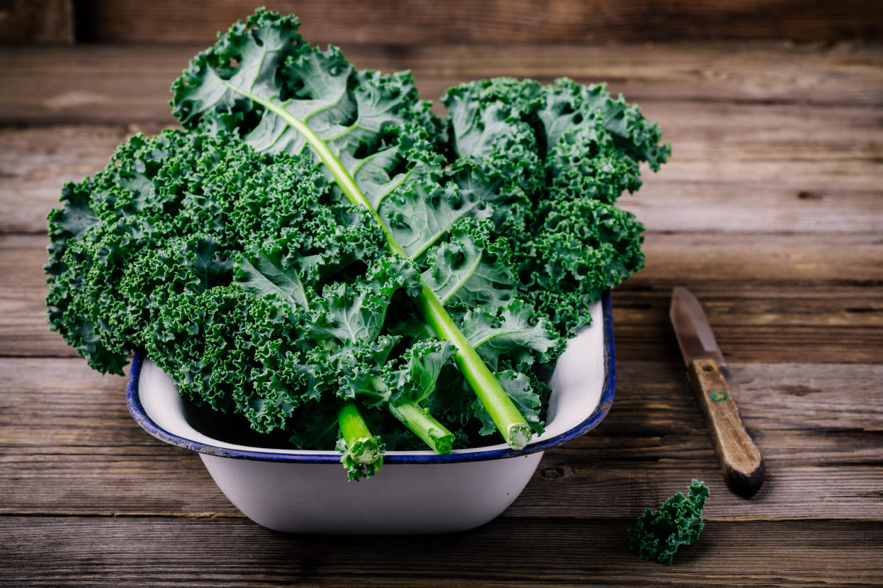 Certain foods can help up your iron intake, including curly kale. (Getty Images)