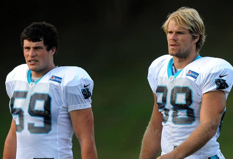 Former Carolina Panthers linebacker Luke Kuechly, left, and tight end Greg Olsen right, walk to the practice fields on Thursday, August 20, 2015.