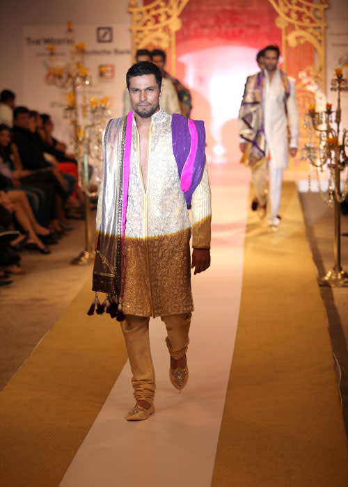 The designer's collection was called 'Majestic Realms'. Showstopper Randeep Hooda walked for the designer in a royal cream sherwani.