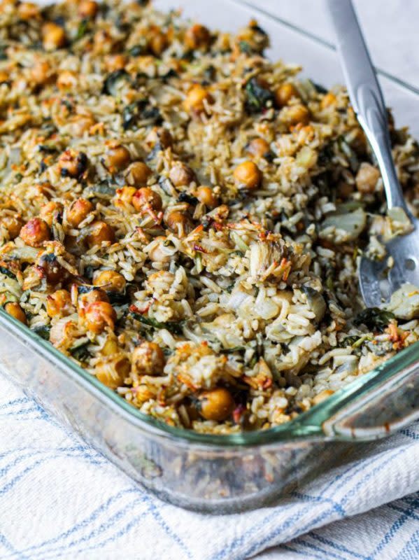 <p>Upbeet Kitchen</p><p>This vegan, gluten-free chickpea brown rice spinach artichoke casserole incorporates the beloved spinach-artichoke combination into a grounding, nourishing vegan casserole that sticks to your ribs and is guaranteed to warm you right up.</p><p><strong>Get the recipe: <a href="https://upbeetkitchen.com/2020/09/13/chickpea-brown-rice-spinach-artichoke-casserole-vegan/" rel="nofollow noopener" target="_blank" data-ylk="slk:Chickpea Brown Rice Spinach Artichoke Casserole;elm:context_link;itc:0;sec:content-canvas" class="link rapid-noclick-resp">Chickpea Brown Rice Spinach Artichoke Casserole</a></strong></p>