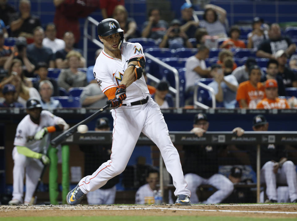 Miami Marlins’ Giancarlo Stanton needs to hit just one more home run to reach 60 for the season (AP Photo)