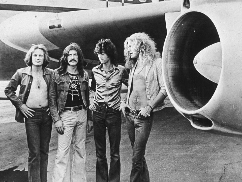 Airway to heaven: (from left) Led Zeppelin’s John Paul Jones, John Bonham, Jimmy Page and Robert Plant in front of their private airliner, The Starship, in 1973 (Getty)