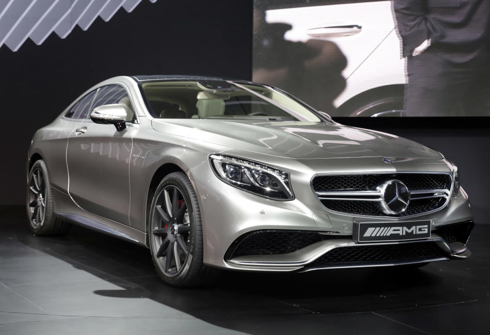 The 2015 Mercedes Benz S63 AMG Coupe is introduced at the 2014 New York International Auto Show at the Javits Convention Center, Wednesday, April 16, 2014, in New York. (AP Photo/Richard Drew)