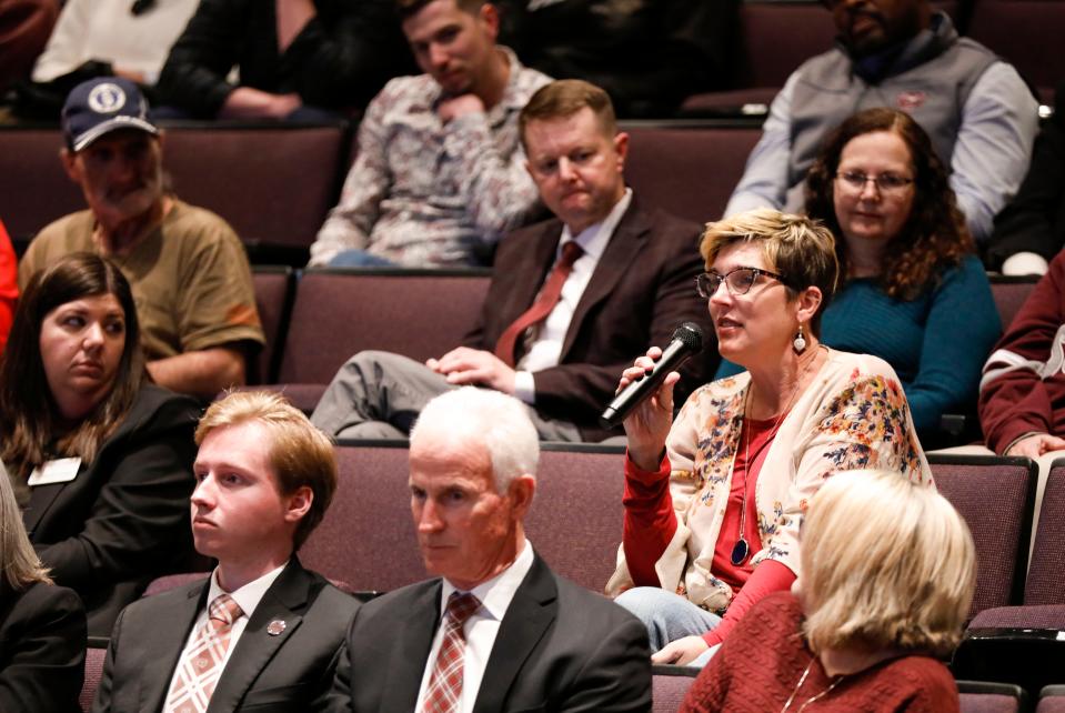 Missouri State University English Professor Shannon Wooden asks a question to a finalist for the university president job, Richard "Biff" Williams, in the Plaster Student Union auditorium on Thursday, Feb. 15, 2024.
