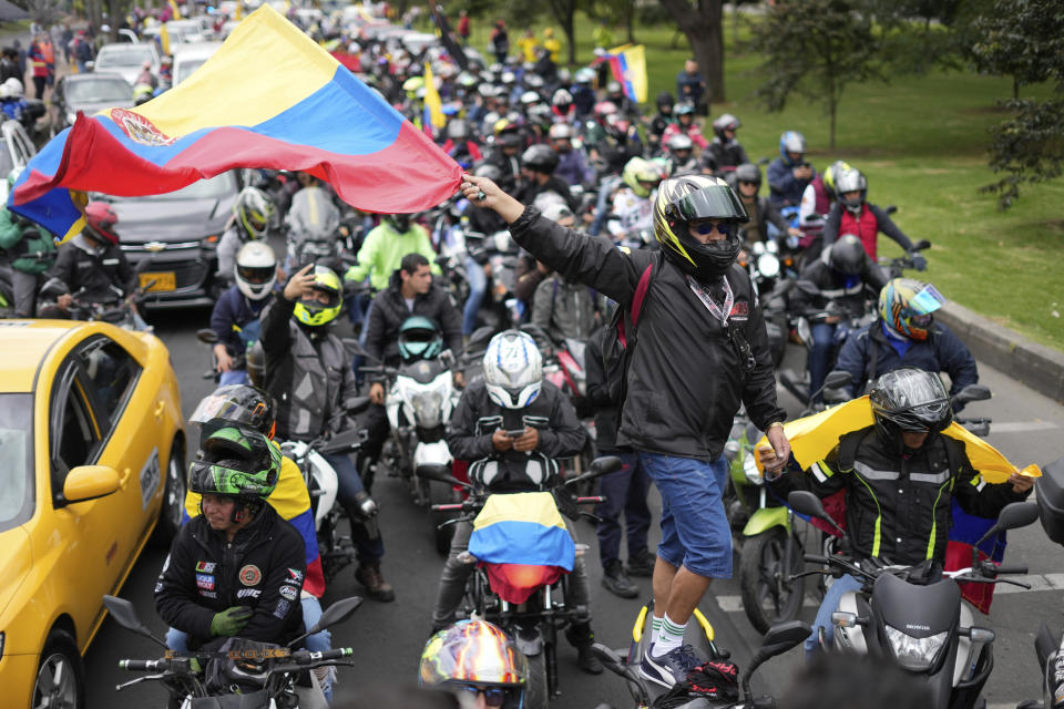 Motorcycle riders hold a caravan to protest the increase in gas prices in Bogota, Colombia, Monday, Aug. 28, 2023. (AP Photo/Fernando Vergara)