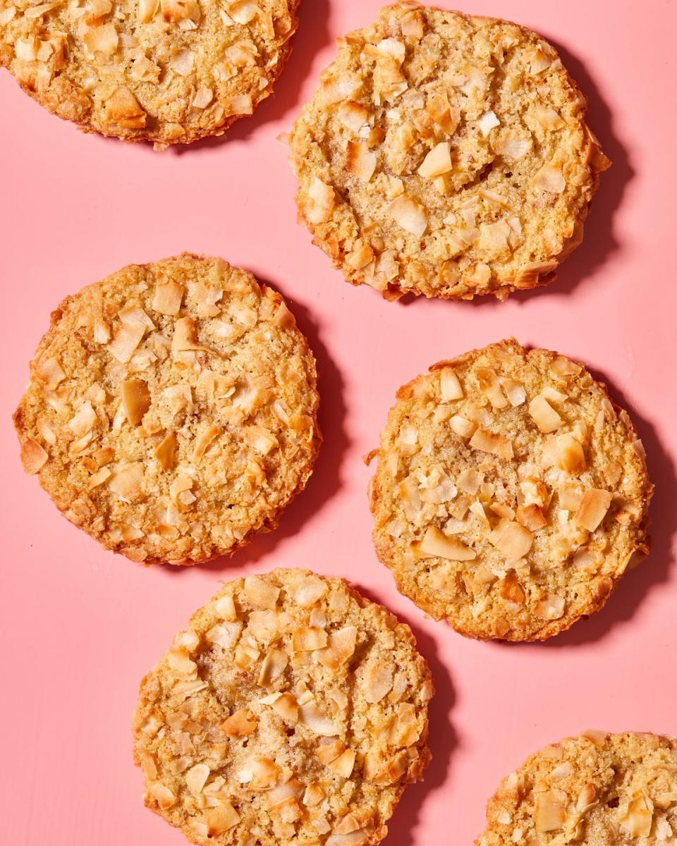 <p>Soft, chewy, slightly golden crispy edges with crispy toasted coconut strewn throughout, these coconut cookies are not too shy to highlight their star ingredient. Topped with even<em> more</em> coconut right before baking, these chewy cookies with a crispy edge are a coconut lover's dream.</p><p>Get the <strong><a href="https://www.delish.com/cooking/recipe-ideas/a40850942/coconut-cookies-recipe/" rel="nofollow noopener" target="_blank" data-ylk="slk:Coconut Cookies recipe;elm:context_link;itc:0;sec:content-canvas" class="link ">Coconut Cookies recipe</a></strong>. </p>