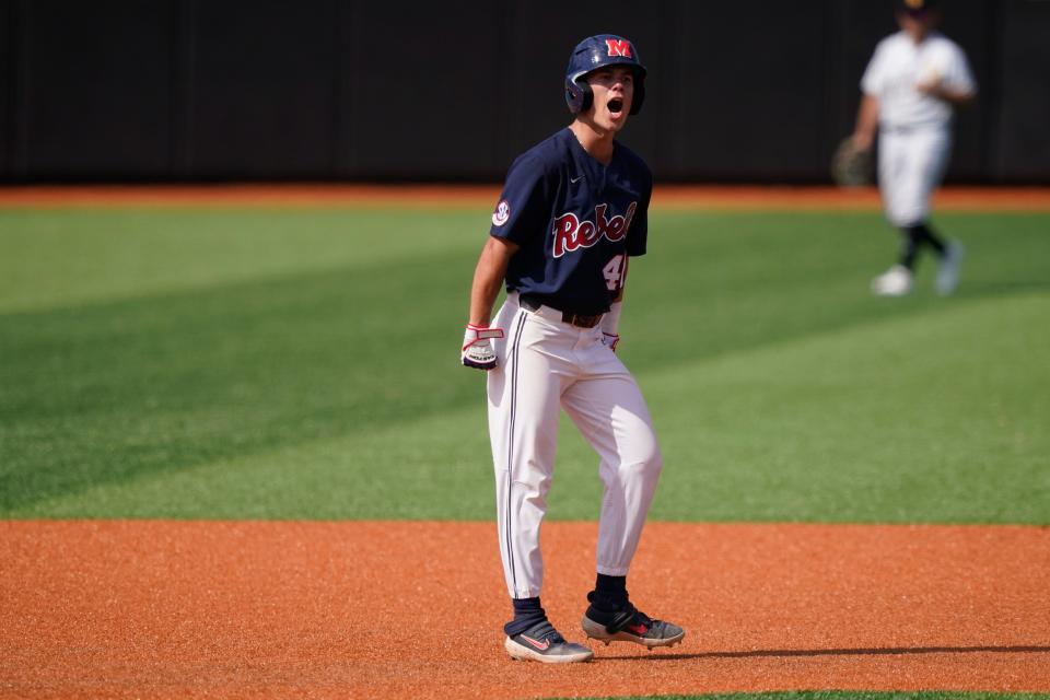 Mississippi's Garrett Wood (40) reacts after hitting a double in the fourth inning of an NCAA college baseball tournament super regional game against Southern Mississippi, Saturday, June 11, 2022, in Hattiesburg, Miss. (AP Photo/Rogelio V. Solis)