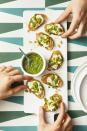 <p>Spread fresh, slightly spicy pesto on crispy slices of bread and add a schmear of ricotta for an easy, healthy appetizer.</p><p>Get the <strong><a href="https://www.goodhousekeeping.com/food-recipes/easy/a19865763/arugula-pesto-recipe/" rel="nofollow noopener" target="_blank" data-ylk="slk:Arugula Pesto recipe;elm:context_link;itc:0;sec:content-canvas" class="link ">Arugula Pesto recipe</a></strong>.</p><p><strong>RELATED:</strong> <a href="https://www.goodhousekeeping.com/food-recipes/healthy/g845/healthy-appetizers/" rel="nofollow noopener" target="_blank" data-ylk="slk:40 Easy, Healthy Appetizers That Are Delicious and Filling;elm:context_link;itc:0;sec:content-canvas" class="link ">40 Easy, Healthy Appetizers That Are Delicious and Filling</a></p>