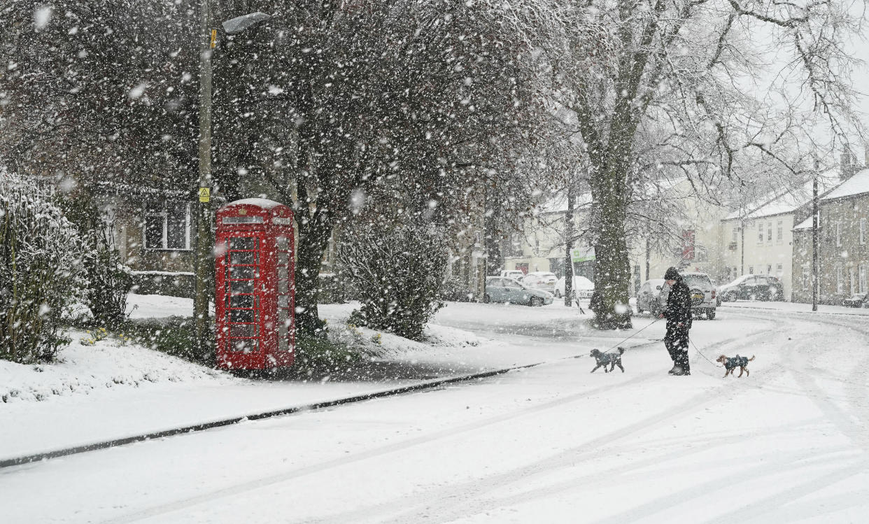 Heavy snow in Allendale, northern England, Wednesday April 3, 2019, after temperatures dipped below freezing overnight.  According to forecasters gales, sleet and snow on high ground are expected for parts of the UK as the chilly snap keeps hold. (Owen Humphreys/PA via AP)