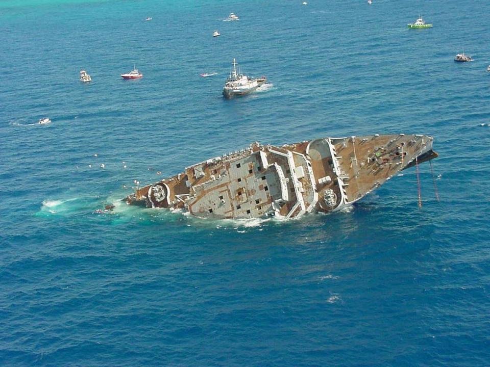 The Spiegel Grove rolls over after it sunk prematurely Friday, May 17, 2002, in the Florida Keys National Marine Sanctuary. The vessel was being prepared to be intentionally sunk as an artificial reef, but began taking on water faster than expected. All personnel evacuated the ship without incident.