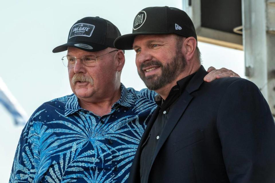 Kansas City Chiefs head coach Andy Reid, left, and Garth Brooks pose for photos after Brooks announced his new sports radio venture called “Tailgate Radio” at Kauffman Stadium on Tuesday, Aug. 29, 2023, in Kansas City.