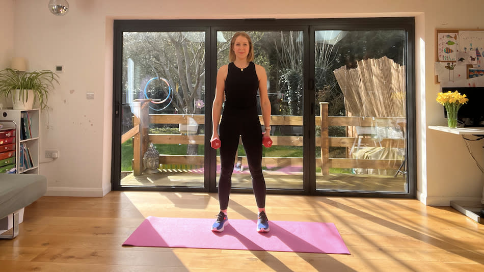 Maddy Biddulph starting a lateral arm raise