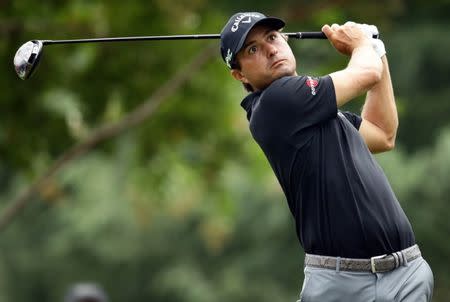 Aug 11, 2017; Charlotte, NC, USA; Kevin Kisner tees off on the 11th hole during the second round of the 2017 PGA Championship at Quail Hollow Club. Mandatory Credit: Rob Schumacher-USA TODAY Sports