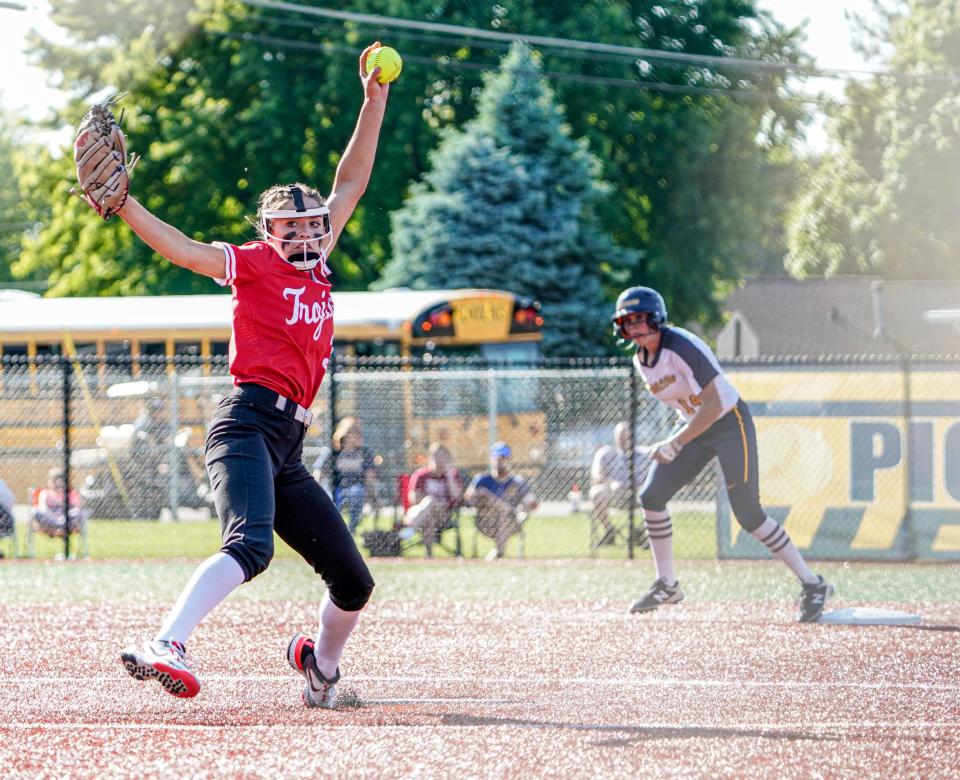 Center Grove's Riley Henson (3) pitches during a game between the Center Grove High School Trojans and the Mooresville High School Pioneers on Monday, May 23, 2022, at Mooresville Schools in Ind. 