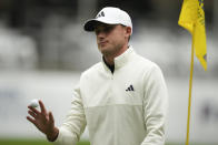 Ludvig Aberg, of Sweden, waves after making a putt on the 15th hole during the final round of the RBC Heritage golf tournament, Sunday, April 21, 2024, in Hilton Head Island, S.C. (AP Photo/Chris Carlson)