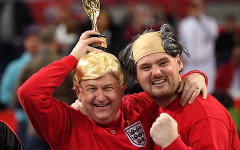 Fans dressed as former England players enjoy the pre match atmosphere prior to the UEFA Euro 2020 qualifier between England and Montenegro at Wembley Stadium - Credit: GETTY IMAGES