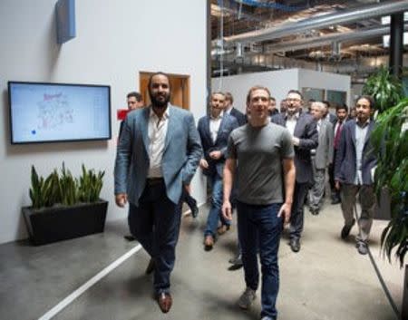 Saudi Arabia's Deputy Crown Prince Mohammed bin Salman (L) walks with Facebook CEO Mark Zuckerberg at the tech giant's headquarters in Silicon Valley, U.S. June 22, 2016. Saudi Royal Court/Handout via REUTERS