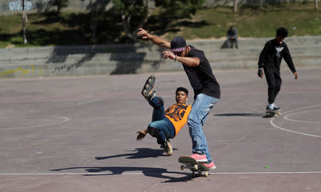 Members of Gaza Skating Team, Mohammad Al-Sawalhe, 23, and Mustafa Sarhan, 19, practice their rollerblading and skating skills in Gaza City March 10, 2019. REUTERS/Mohammed Salem