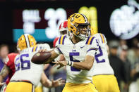 LSU quarterback Jayden Daniels (5) throws a pass in the first half of the Southeastern Conference Championship football game against Georgia Saturday, Dec. 3, 2022 in Atlanta. (AP Photo/John Bazemore)