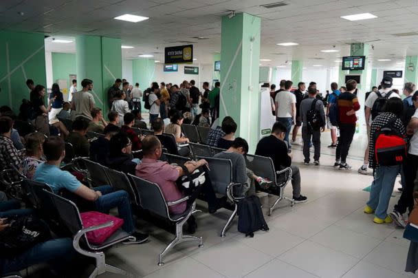 PHOTO: Russians wait and lineup to get Kazakhstan's INN in a public service center in Almaty, Kazakhstan, on Sept. 27, 2022. (Vladimir Tretyakov/NUR.KZ via AP)