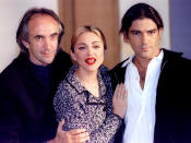 Madonna, who plays Evita Peron in the new film production of the musical "Evita" appears with co-stars Jonathan Pryce (L) and Antonio Banderas, at a photocall to mark the first day of music recording for the film October 2. The film based on the musical by Tim Rice and Andrew Lloyd Webber is directed by Alan Parker