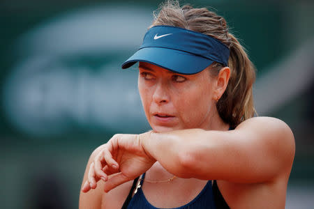 Tennis - French Open - Roland Garros, Paris, France - June 6, 2018 Russia's Maria Sharapova during her quarter final match against Spain's Garbine Muguruza REUTERS/Charles Platiau