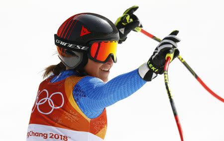 Alpine Skiing - Pyeongchang 2018 Winter Olympics - Women's Downhill - Jeongseon Alpine Centre - Pyeongchang, South Korea - February 21, 2018 - Sofia Goggia of Italy reacts after her run. REUTERS/Kai Pfaffenbach