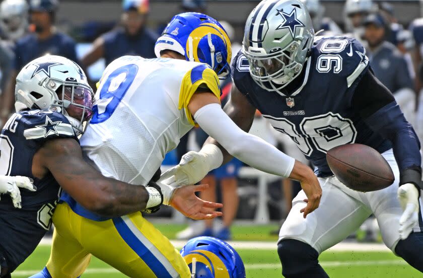 Inglewood, California October 9, 2022- Rams quarterback Matthew Stafford fumbles the ball.