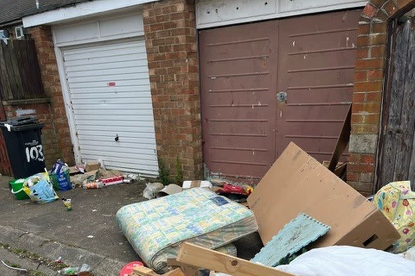 The piles of rubbish, which contained drugs paraphernalia, before the fire