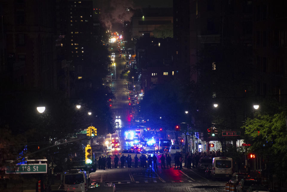 Officers with the New York Police Department gather on Amsterdam Avenue during a raid of the encampment by pro-Palestinian protesters at Columbia University on Tuesday, April 30, 2024, in New York. The protesters had seized the administration building, known as Hamilton Hall, more than 20 hours earlier in a major escalation as demonstrations against the Israel-Hamas war spread on college campuses nationwide. (Marco Postigo Storel via AP)