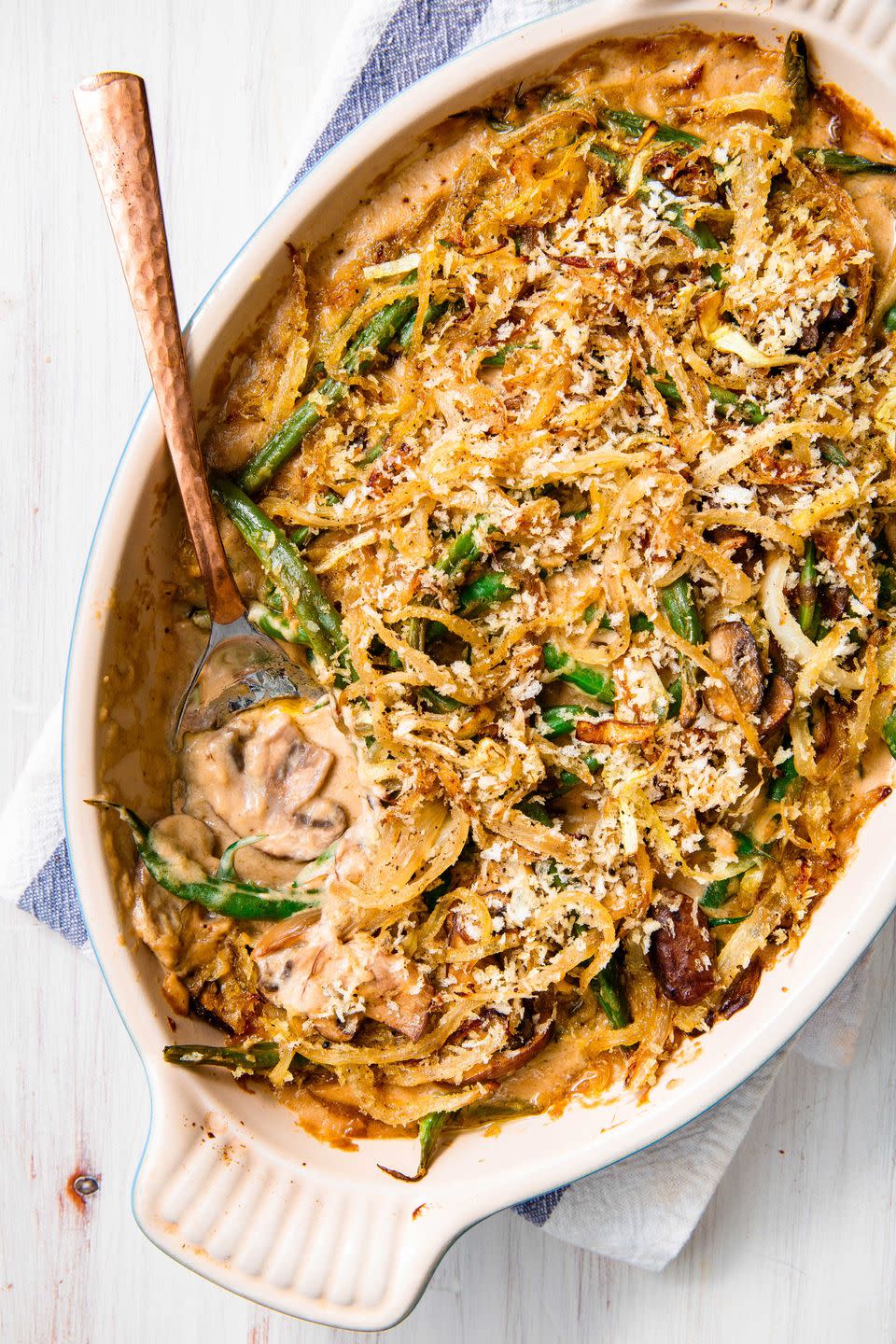 <p>Never fear, this lightened-up <a href="https://www.delish.com/holiday-recipes/thanksgiving/a55340/easy-homemade-classic-green-bean-casserole-recipe/" rel="nofollow noopener" target="_blank" data-ylk="slk:green bean casserole;elm:context_link;itc:0;sec:content-canvas" class="link ">green bean casserole</a> is here to help you save room for <a href="https://www.delish.com/cooking/recipe-ideas/recipes/a55688/easy-homemade-pumpkin-pie-recipe-from-scratch/" rel="nofollow noopener" target="_blank" data-ylk="slk:pumpkin pie;elm:context_link;itc:0;sec:content-canvas" class="link ">pumpkin pie</a>. Forgoing canned cream of mushroom for a quick homemade mushroom gravy, we'd argue this version is healthier <em>and</em> more delicious than the classic. We dig the sautéed and Panko-ed onion topping, but if you can't part from French's <a href="https://www.delish.com/cooking/recipe-ideas/a28846394/fried-onions-recipe/" rel="nofollow noopener" target="_blank" data-ylk="slk:fried onions;elm:context_link;itc:0;sec:content-canvas" class="link ">fried onions</a>, we won't judge ya.</p><p>Get the <strong><a href="https://www.delish.com/holiday-recipes/thanksgiving/a23011385/best-healthy-green-bean-casserole-recipe/" rel="nofollow noopener" target="_blank" data-ylk="slk:Healthy Green Bean Casserole recipe;elm:context_link;itc:0;sec:content-canvas" class="link ">Healthy Green Bean Casserole recipe</a></strong>. </p>