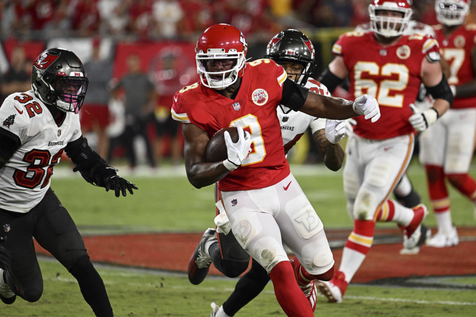 Kansas City Chiefs wide receiver JuJu Smith-Schuster (9) carries the ball during the second half of an NFL football game against the Tampa Bay Buccaneers Sunday, Oct. 2, 2022, in Tampa, Fla. (AP Photo/Jason Behnken)